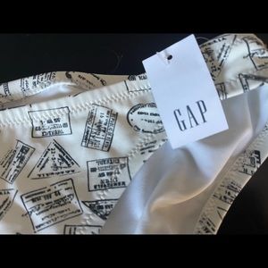 NEW with tags! GAP size small swim bottoms. Passport stamps design.